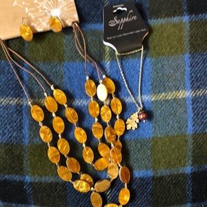 Cracker Barrel jewelry lot. Acrylic wood look necklace and gold tone leaf acorn